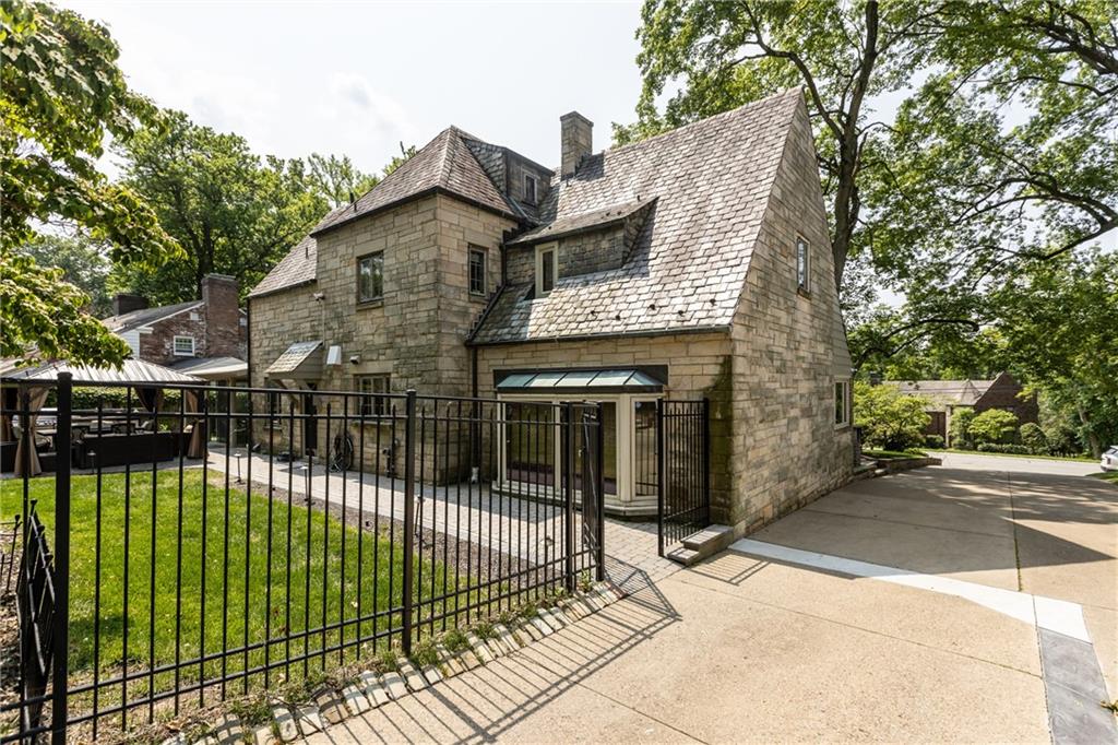 694 Valleyview Road Pittsburgh, PA 15243 - Photo 9 of 50 a view of a house with iron fence