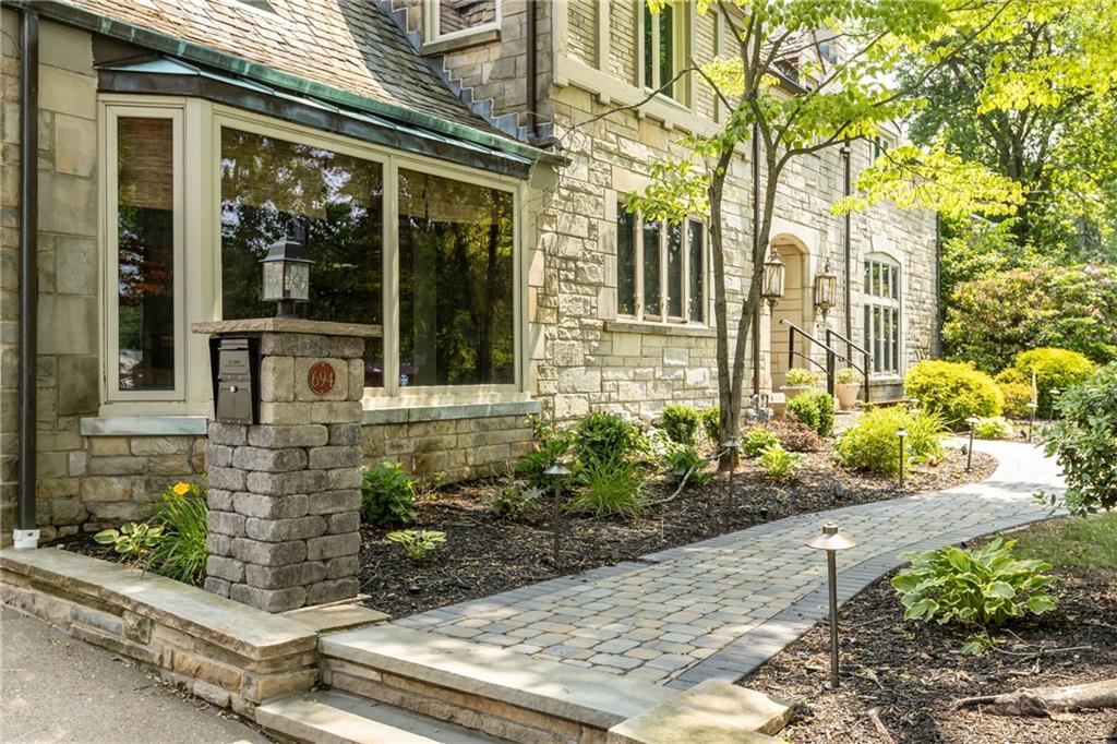 694 Valleyview Road Pittsburgh, PA 15243 - Photo 10 of 50 a front view of a house with a garden
