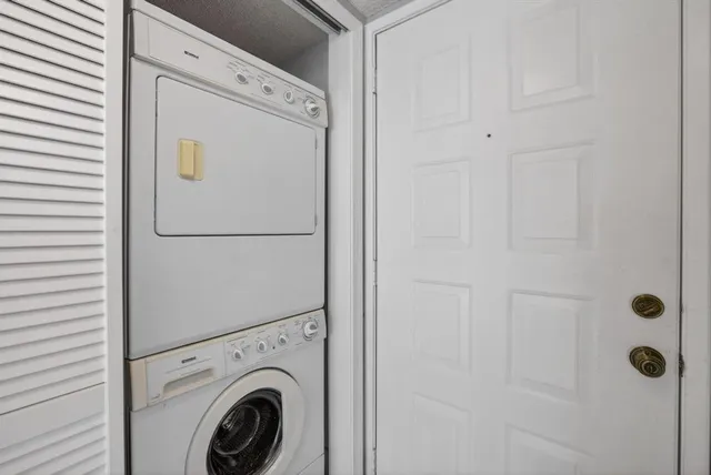 a view of room with window and ceiling fan