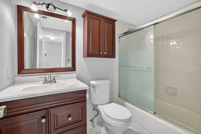 a swimming pool with outdoor seating and yard