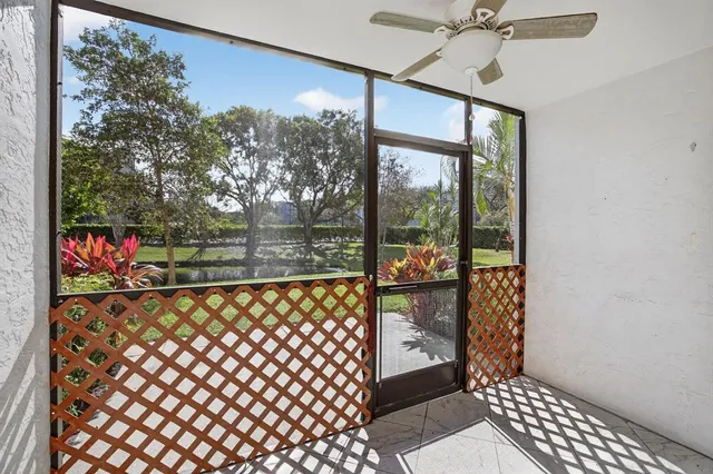 a view of a lake with a building in the background