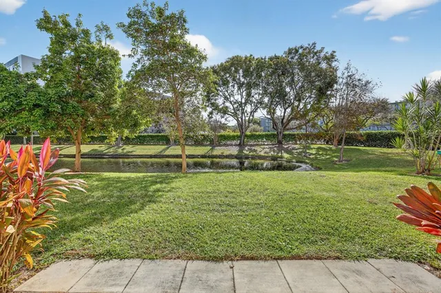 a front view of a house with a yard and porch