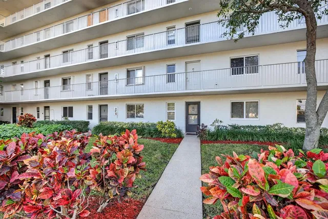 a view of a cars parked in front of a building