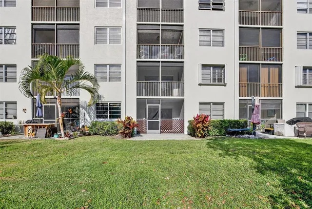 a view of a balcony with wooden floor