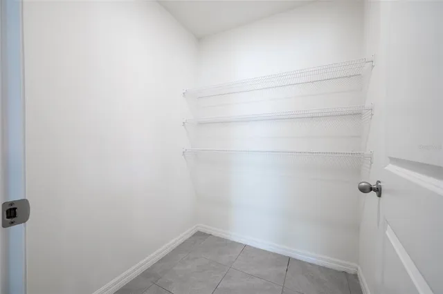 a view of a room with racks on the wall