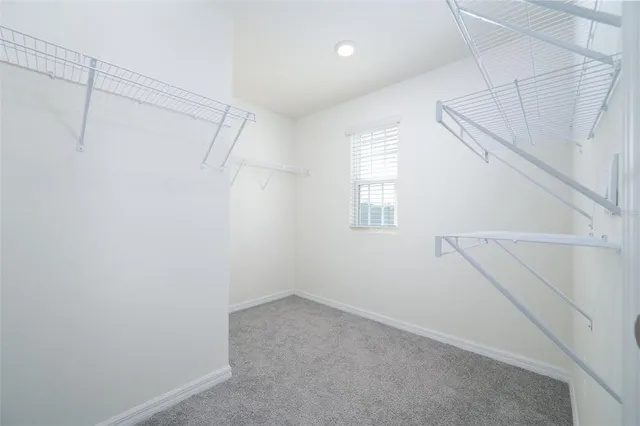 a view of a room with racks on the wall