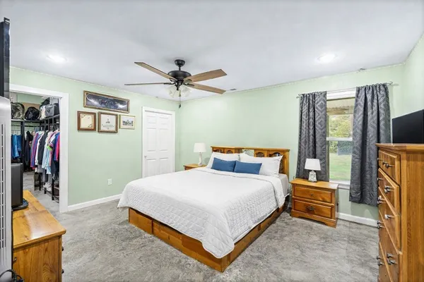a bathroom with a sink toilet and vanity