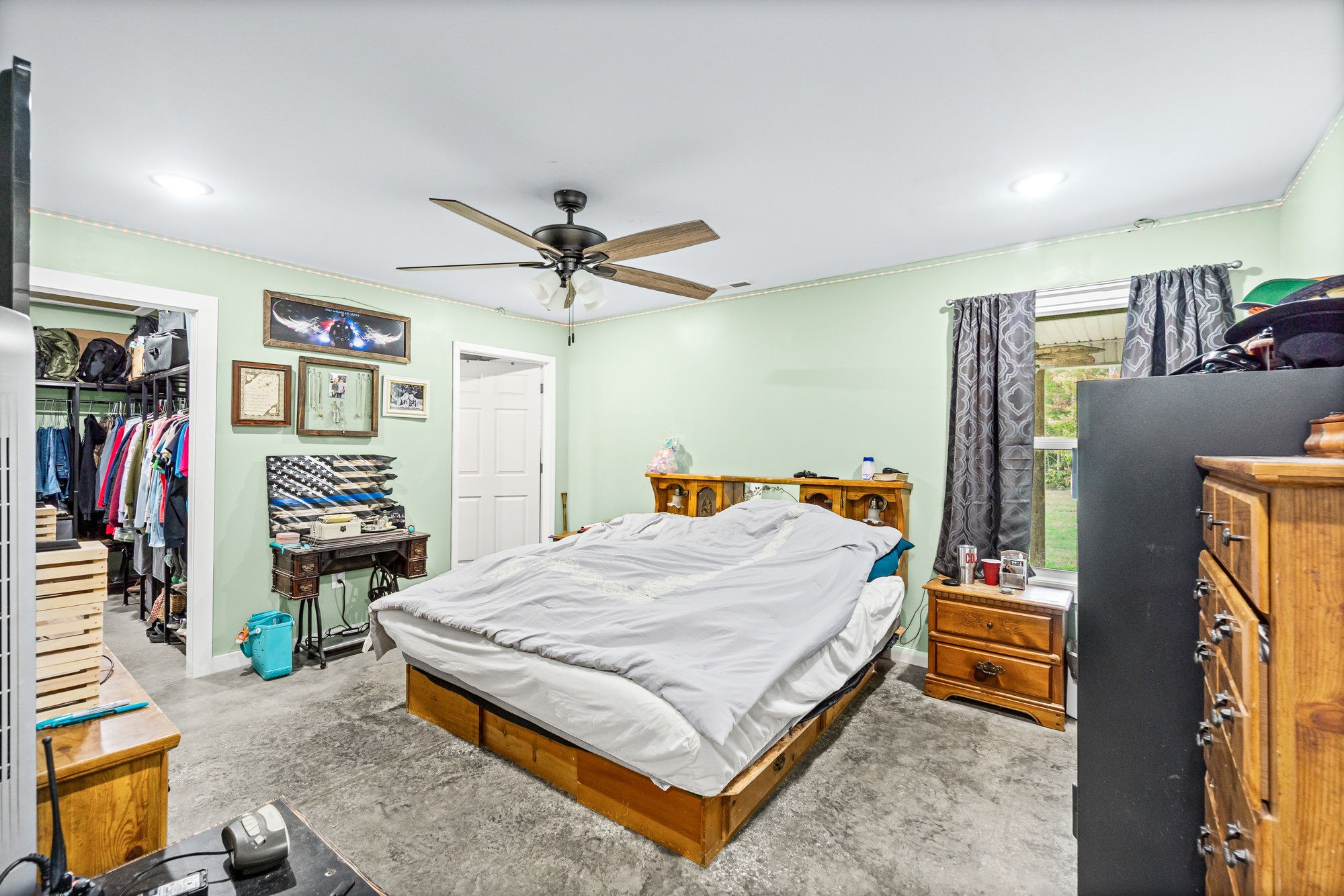 3365 Pea Ridge Road Liberty, TN 37095 - Photo 6 of 24 a bed room with a bed and a flat screen tv