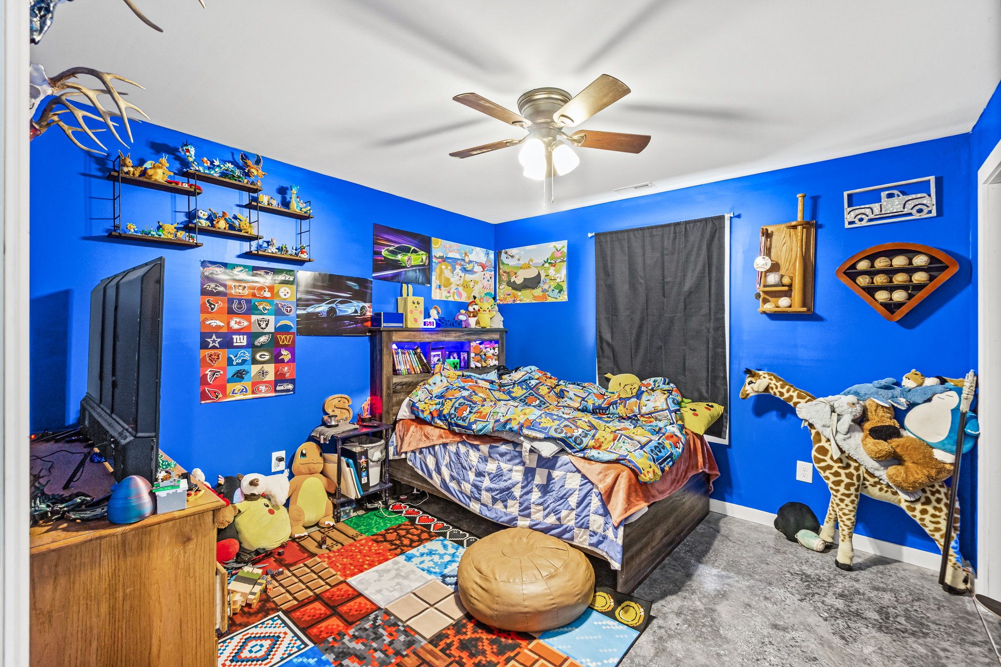 3365 Pea Ridge Road Liberty, TN 37095 - Photo 10 of 24 a bedroom with a bed and a chandelier