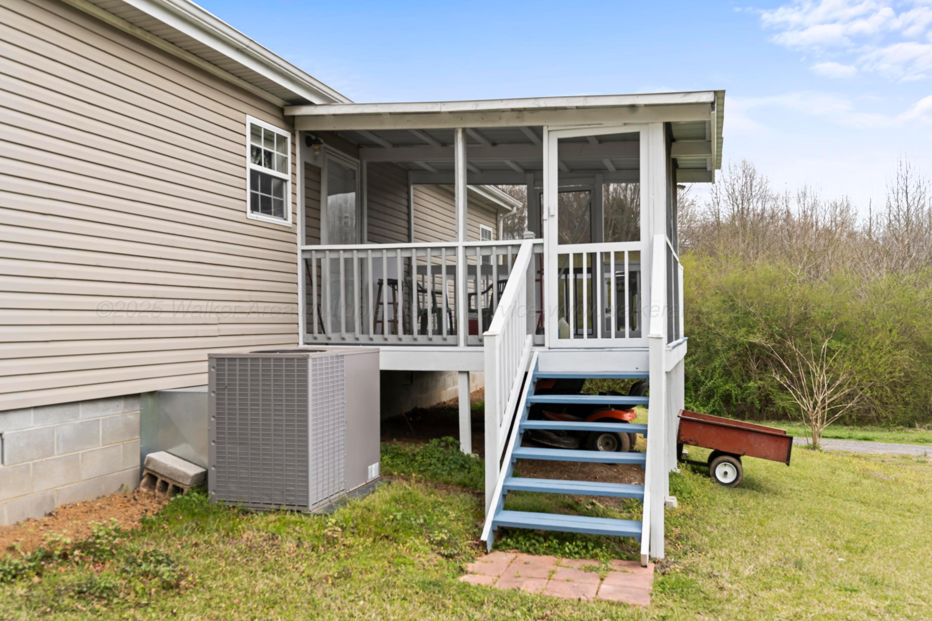 157 Bell Road Falkville, AL 35622 - Photo 24 of 27 Back Screened-In Porch
