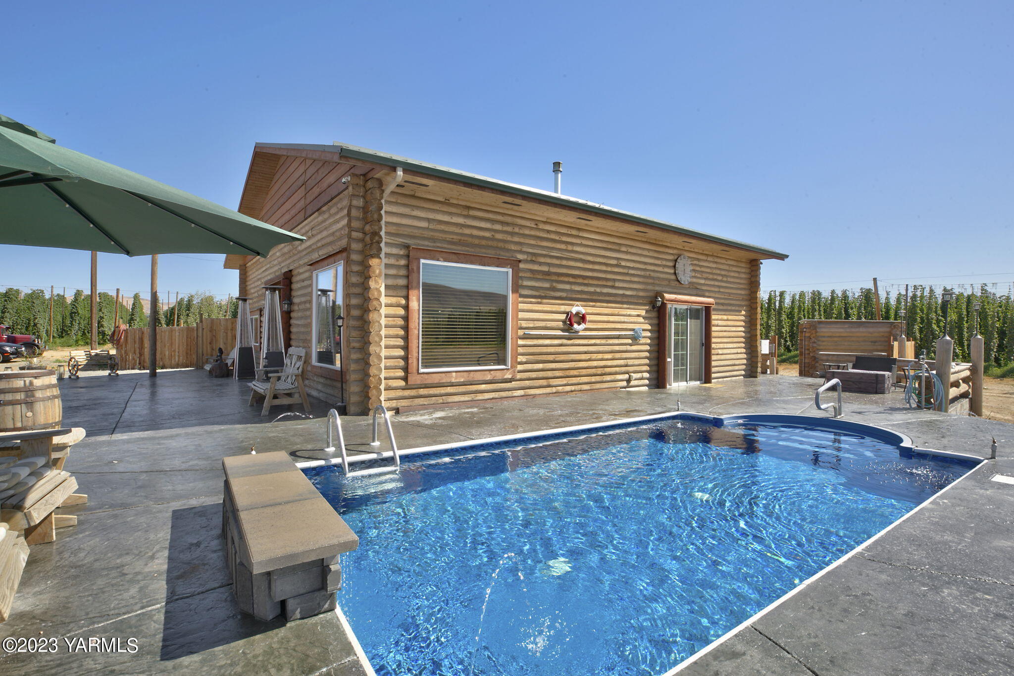 641 Walters Road Moxee, WA 98936 - Photo 17 of 23 a view of a house with backyard and sitting area