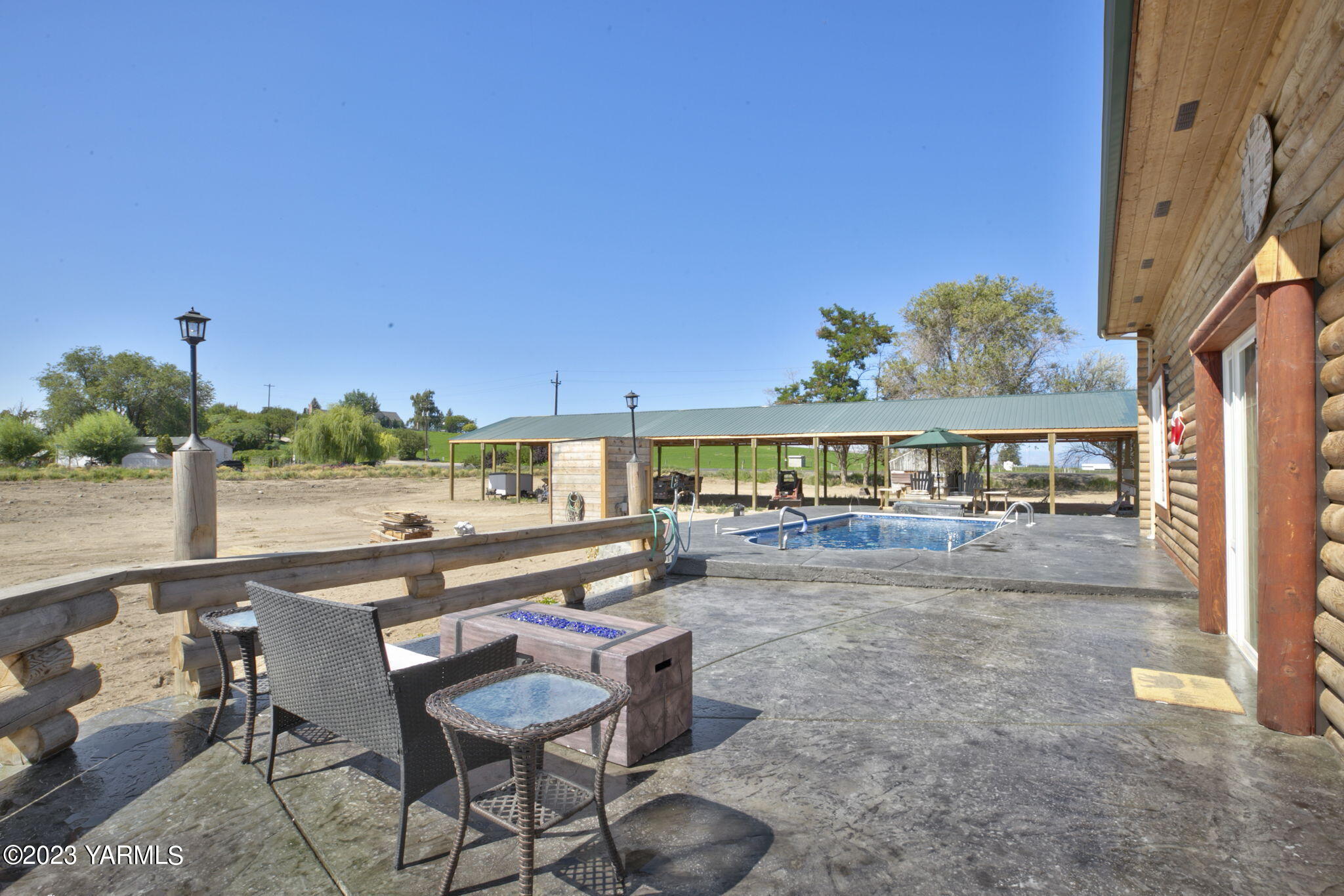641 Walters Road Moxee, WA 98936 - Photo 20 of 23 a view of a patio with swimming pool and sitting area