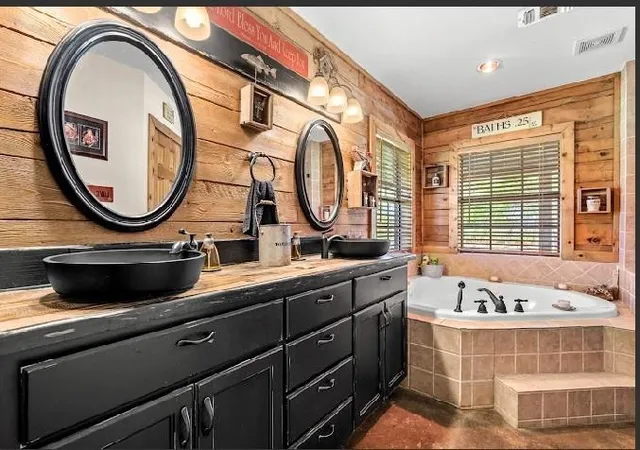a open kitchen with stainless steel appliances granite countertop a sink and a stove