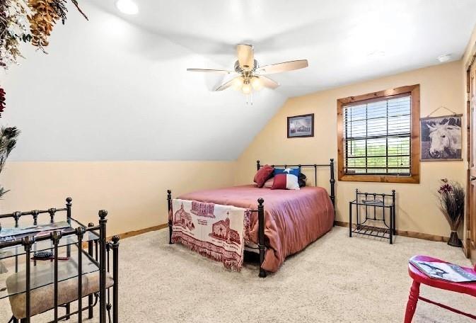 783 County Road 4420 Whitewright, TX 75491 - Photo 19 of 40 a bed room with a bed and a chair