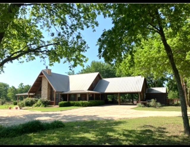 783 County Road 4420 Whitewright, TX 75491 - Photo 2 of 40 a aerial view of a house