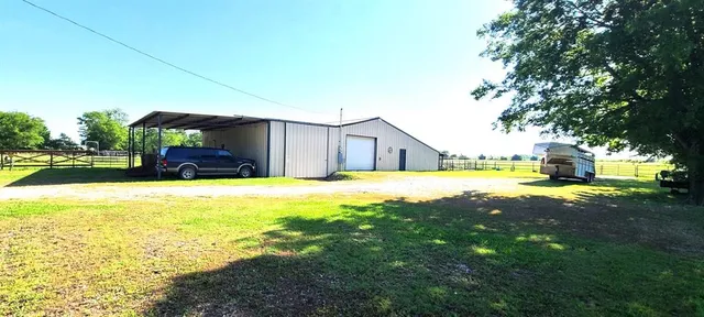 a front view of a house with patio