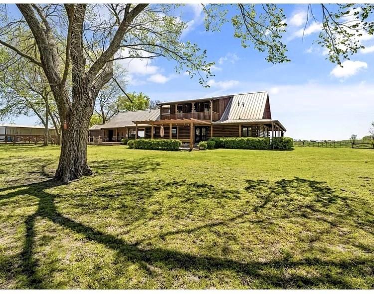 783 County Road 4420 Whitewright, TX 75491 - Photo 4 of 40 a view of swimming pool with lawn chairs and plants