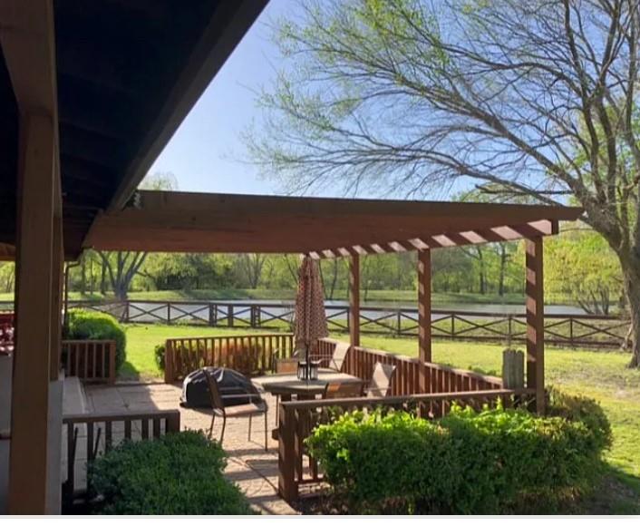 783 County Road 4420 Whitewright, TX 75491 - Photo 5 of 40 a view of swimming pool with outdoor seating