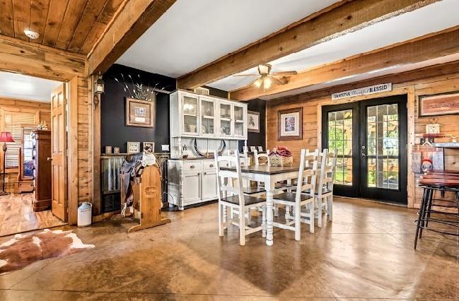 783 County Road 4420 Whitewright, TX 75491 - Photo 10 of 40 a view of a dining hall with furniture and floor to ceiling window