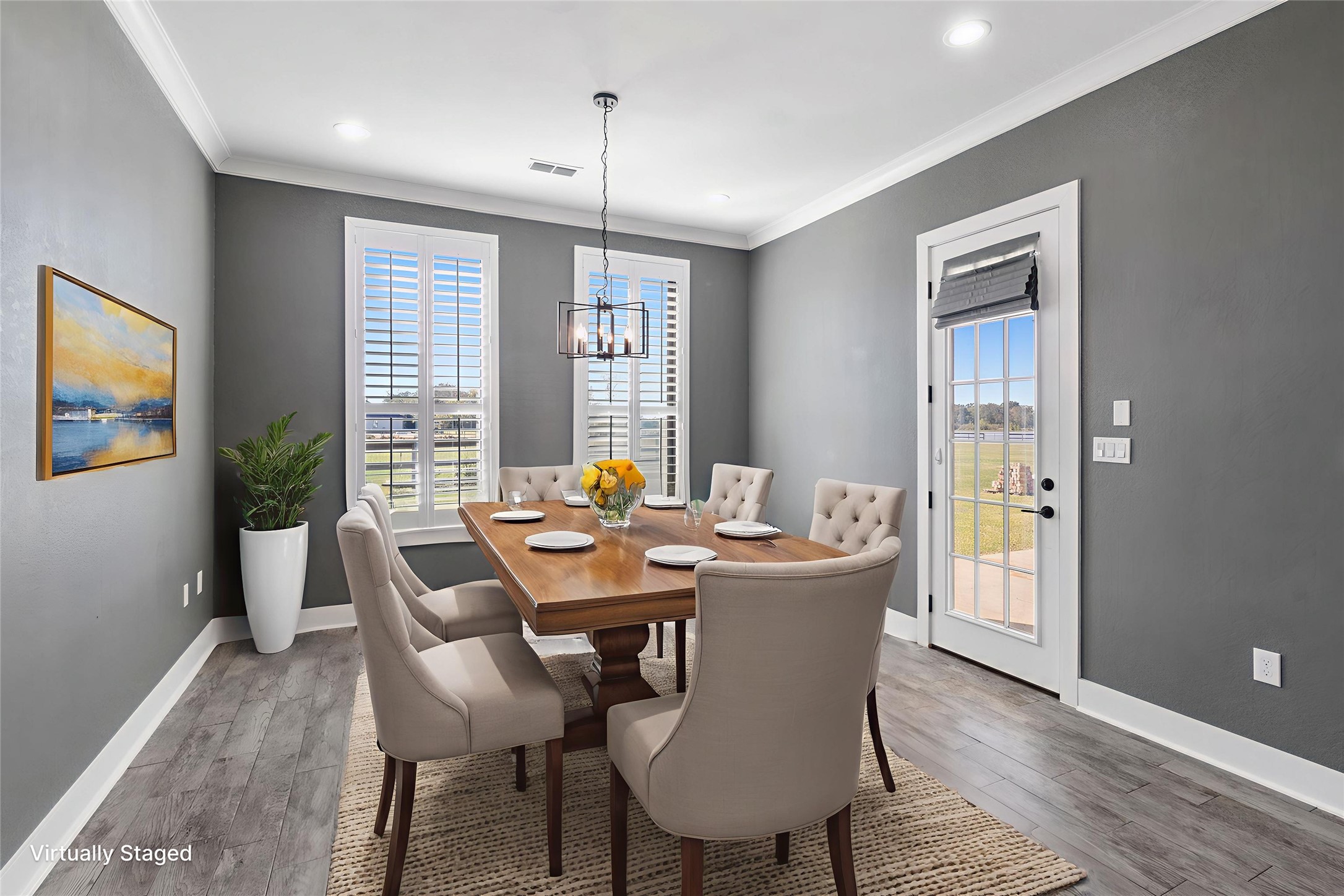 22010 Chenango Lake Drive Angleton, TX 77515 - Photo 11 of 43 a view of a dining room with furniture window and wooden floor