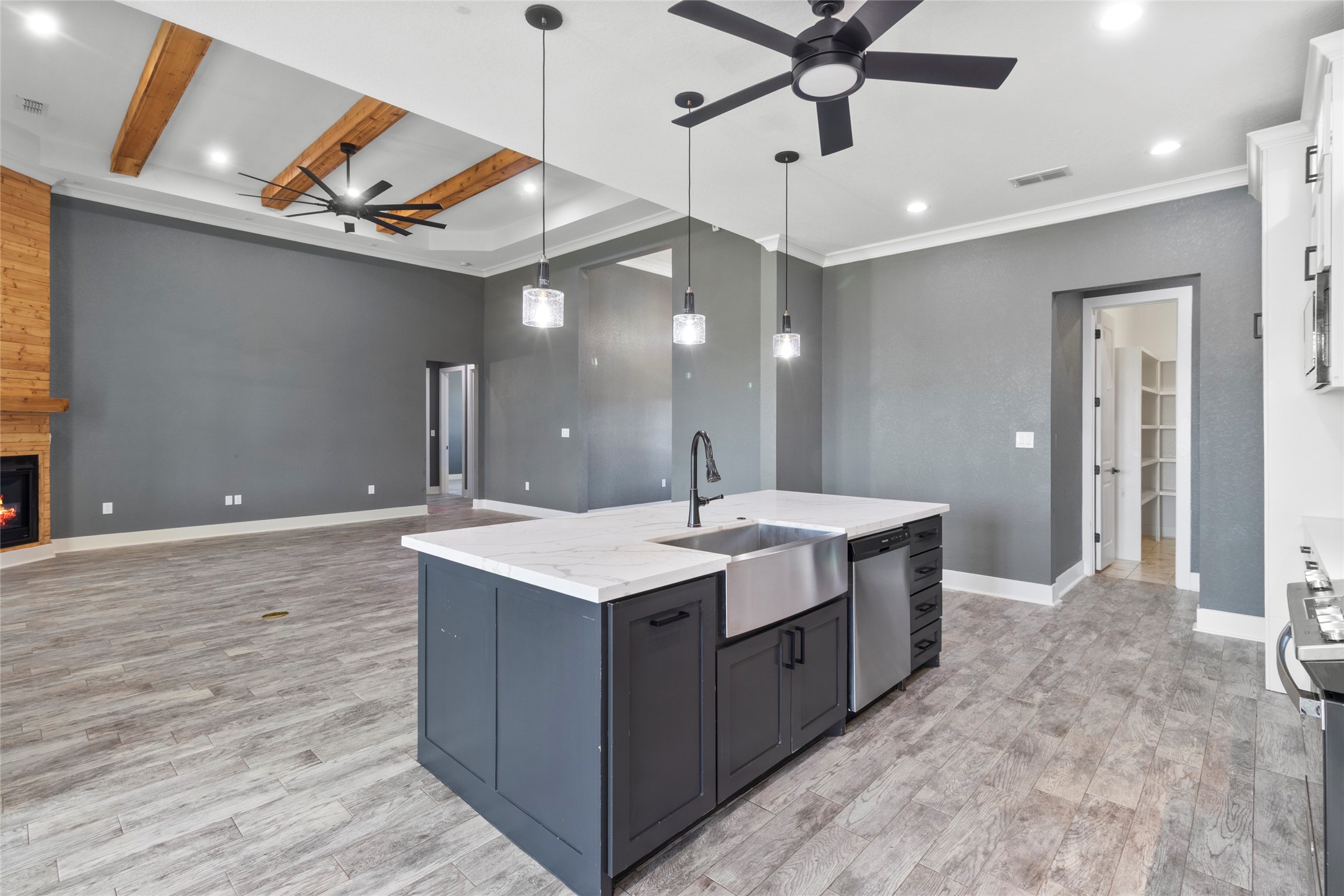 22010 Chenango Lake Drive Angleton, TX 77515 - Photo 12 of 43 a kitchen with a sink and chandelier