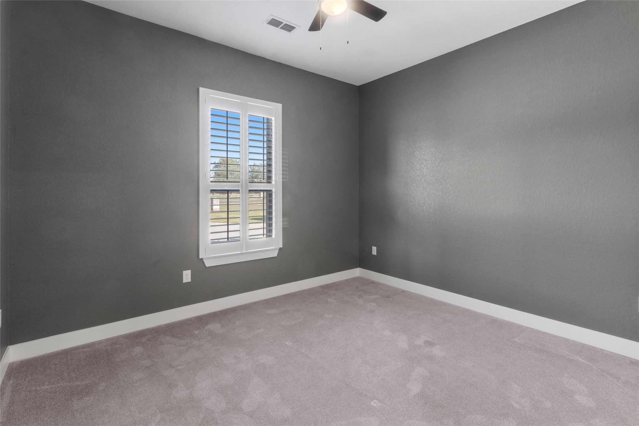 22010 Chenango Lake Drive Angleton, TX 77515 - Photo 23 of 43 an empty room with a window