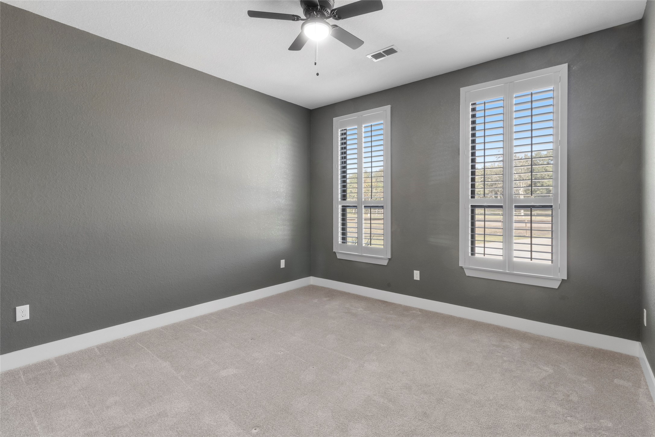 22010 Chenango Lake Drive Angleton, TX 77515 - Photo 24 of 43 a view of an empty room with a window