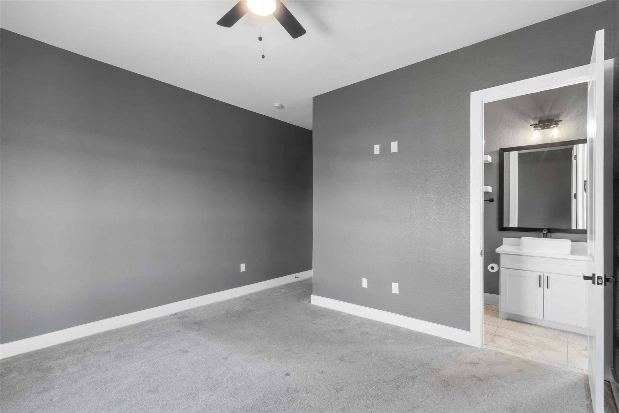22010 Chenango Lake Drive Angleton, TX 77515 - Photo 27 of 43 an empty room with a bathroom