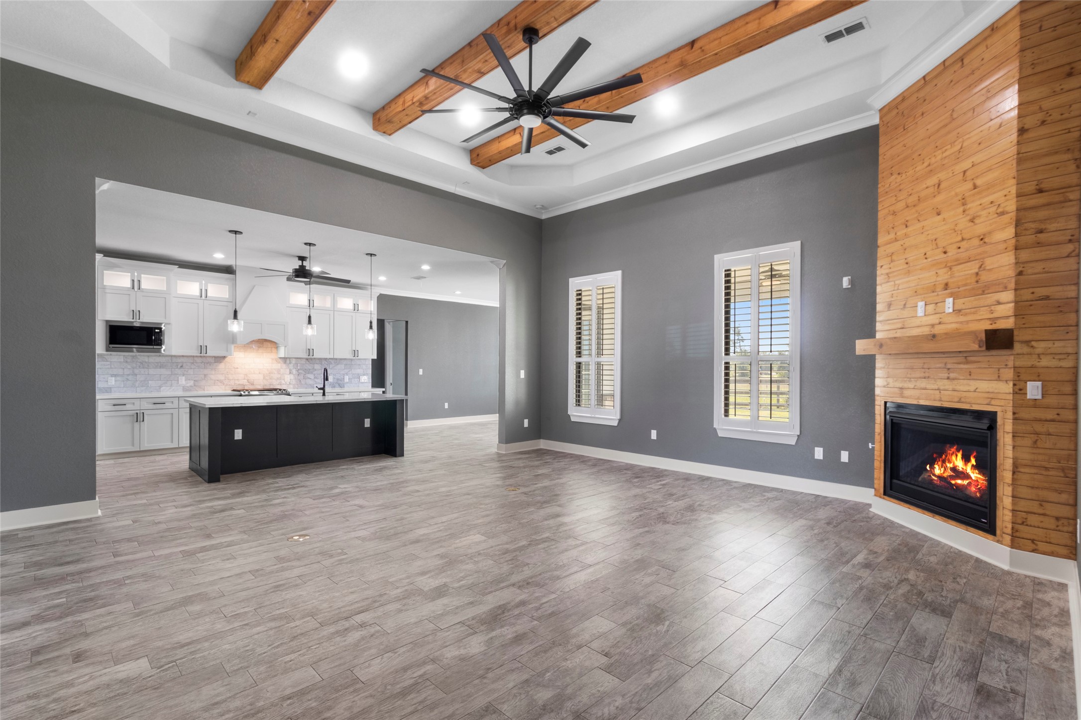 22010 Chenango Lake Drive Angleton, TX 77515 - Photo 5 of 43 a view of an empty room with a fireplace and a window
