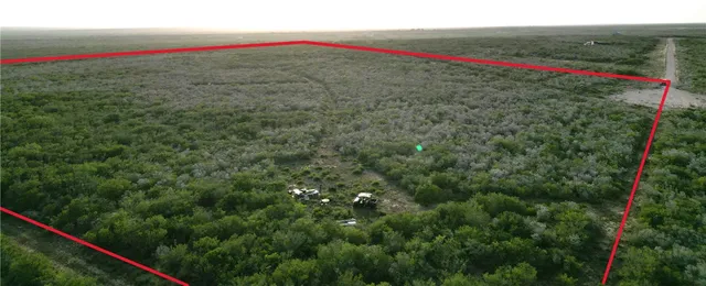 a view of a road with an outdoor space