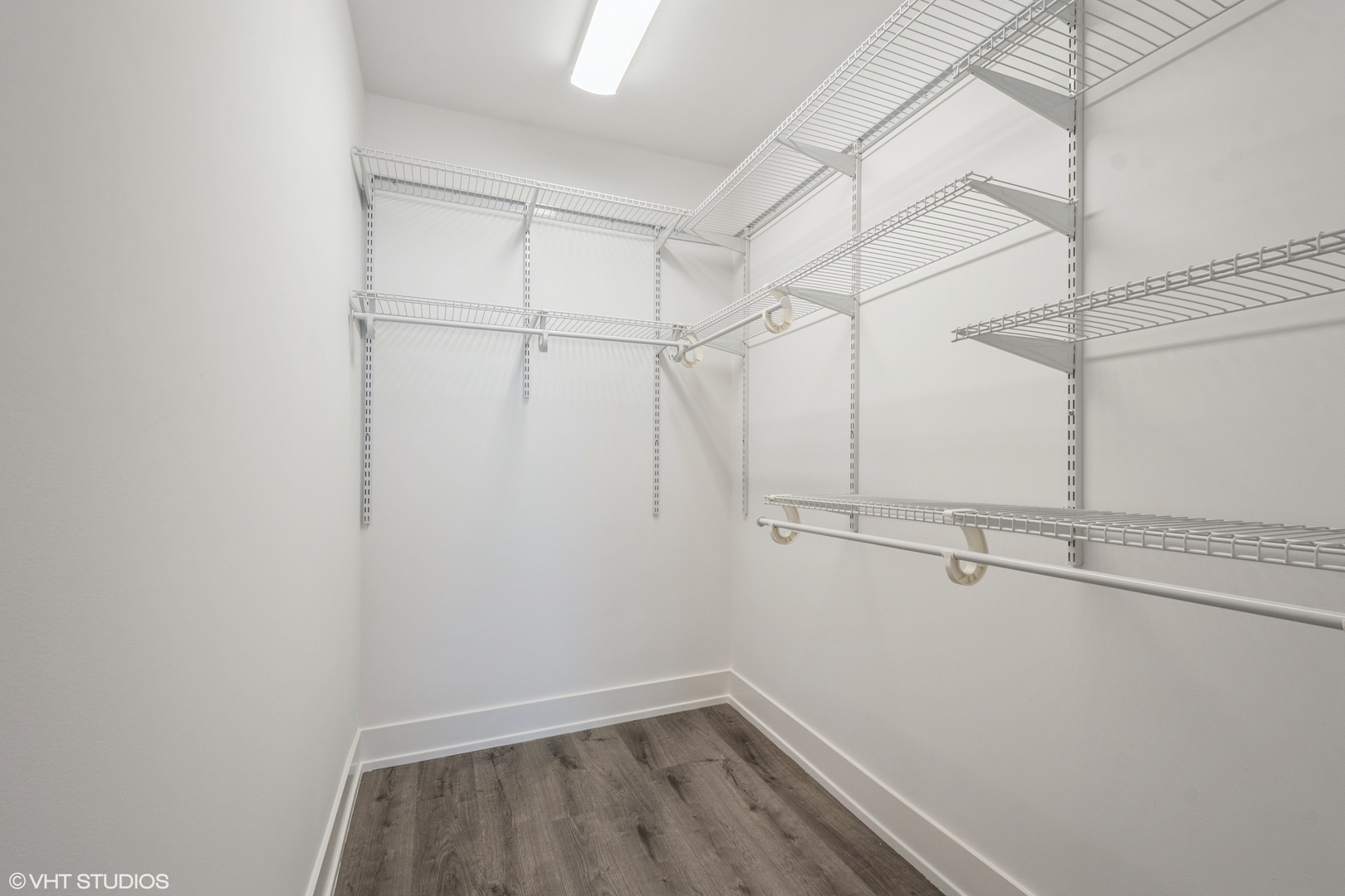 6033 North Sheridan Road, Unit 44D Chicago, IL 60660 - Photo 9 of 12 a view of a room with racks on the wall