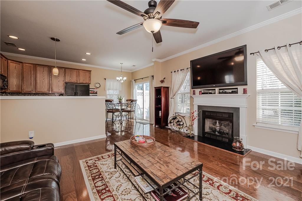 11661 Coddington Ridge Drive Charlotte, NC 28214 - Photo 2 of 23 a living room with furniture and a fireplace