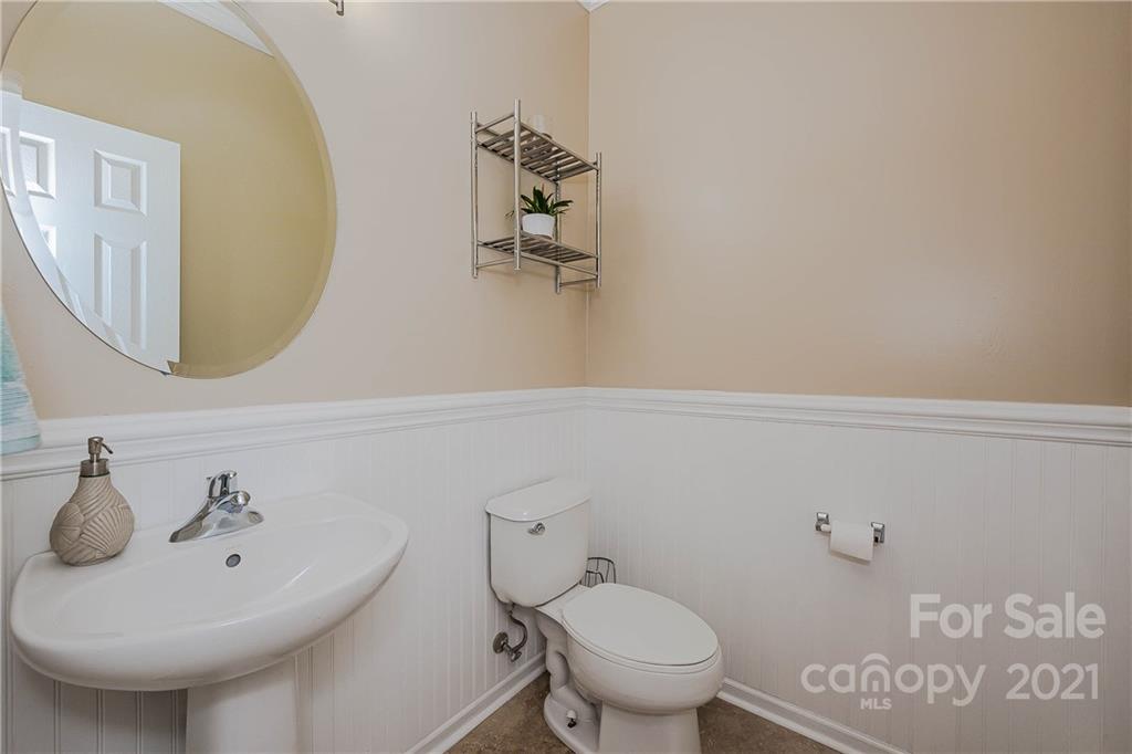 11661 Coddington Ridge Drive Charlotte, NC 28214 - Photo 12 of 23 a bathroom with a sink and mirror