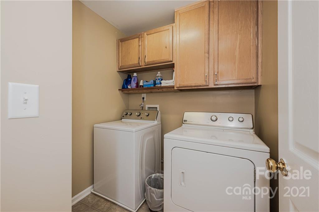 11661 Coddington Ridge Drive Charlotte, NC 28214 - Photo 20 of 23 a utility room with dryer and washer
