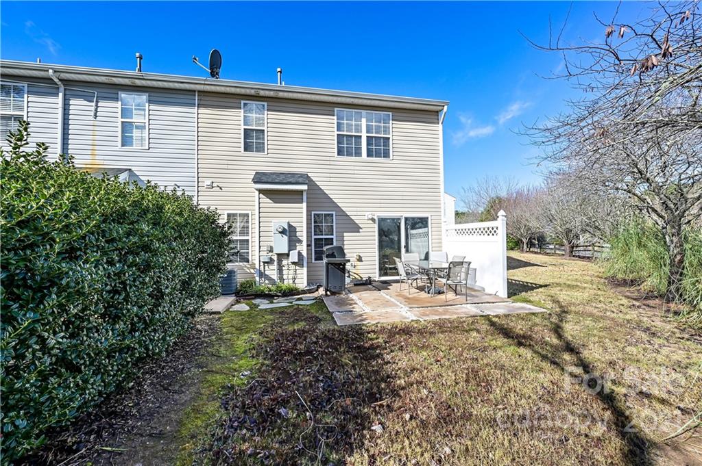 11661 Coddington Ridge Drive Charlotte, NC 28214 - Photo 22 of 23 a view of a house with a patio