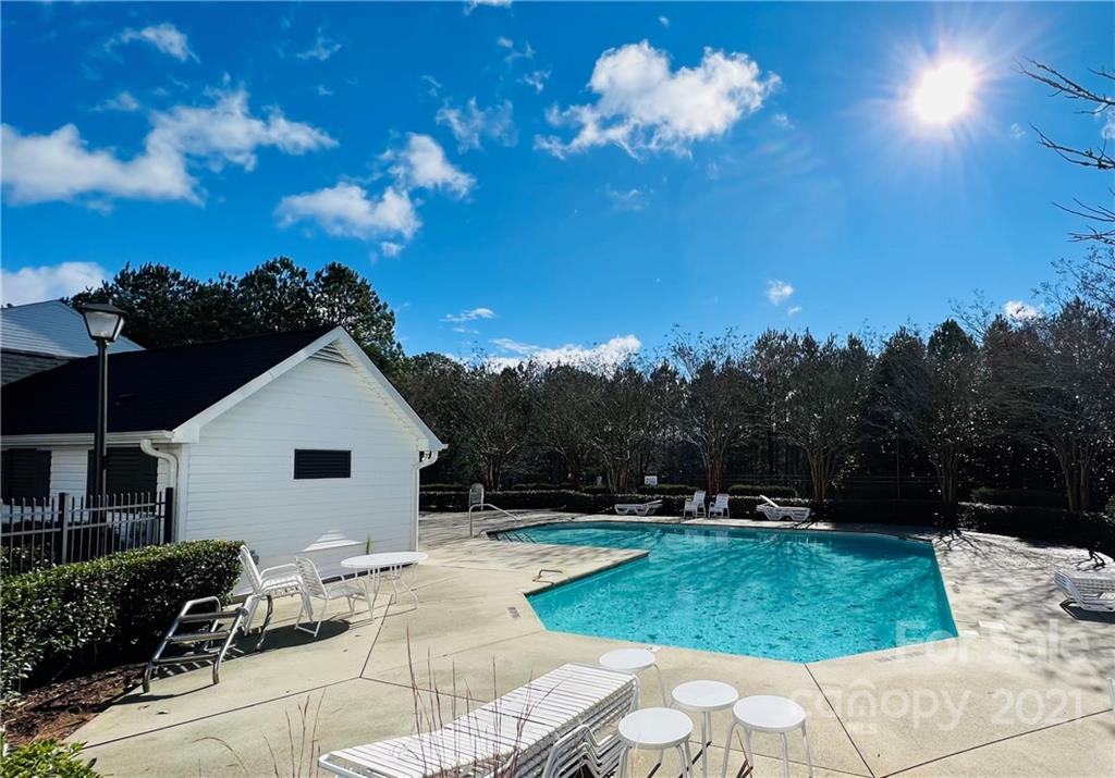 11661 Coddington Ridge Drive Charlotte, NC 28214 - Photo 23 of 23 a view of a house with a backyard