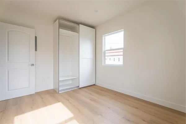 a view of an empty room and window