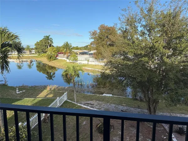 a view of a lake from a balcony
