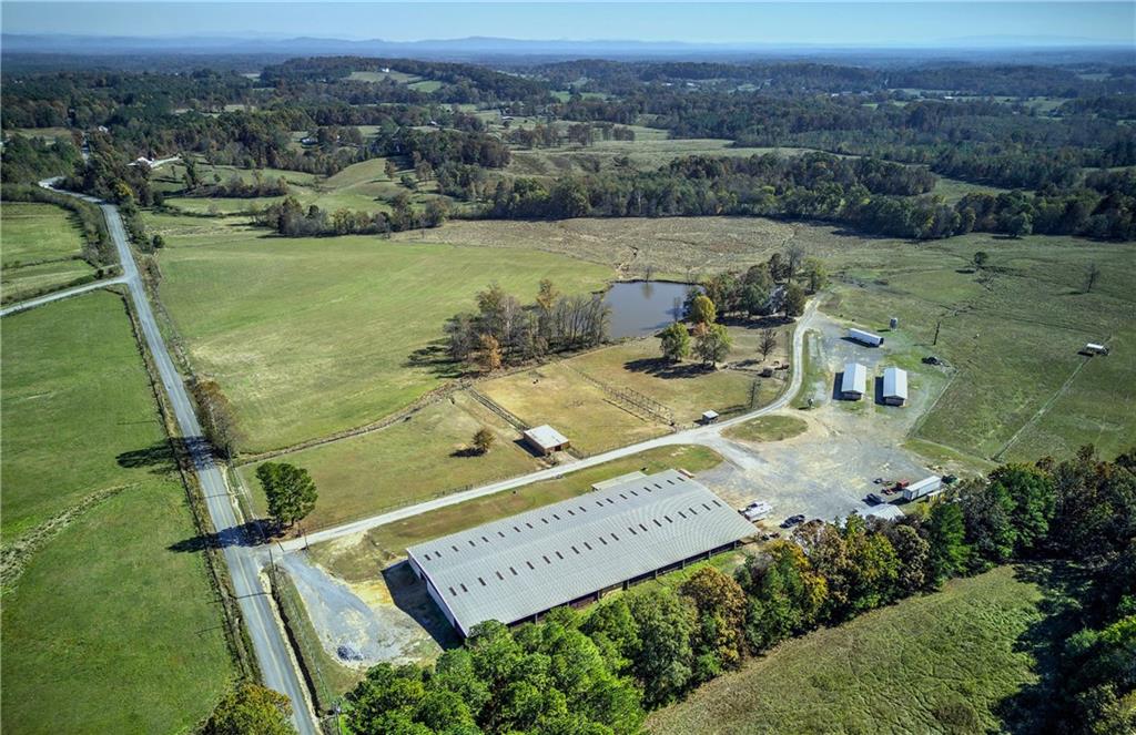 486 County Line Road Resaca, GA 30735 - Photo 48 of 49 an aerial view of a house with outdoor space