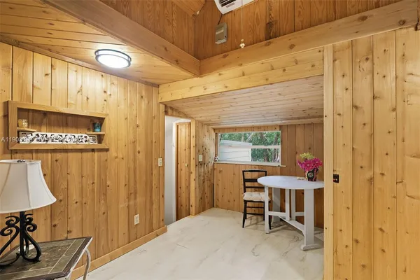 a view of a livingroom with furniture and window