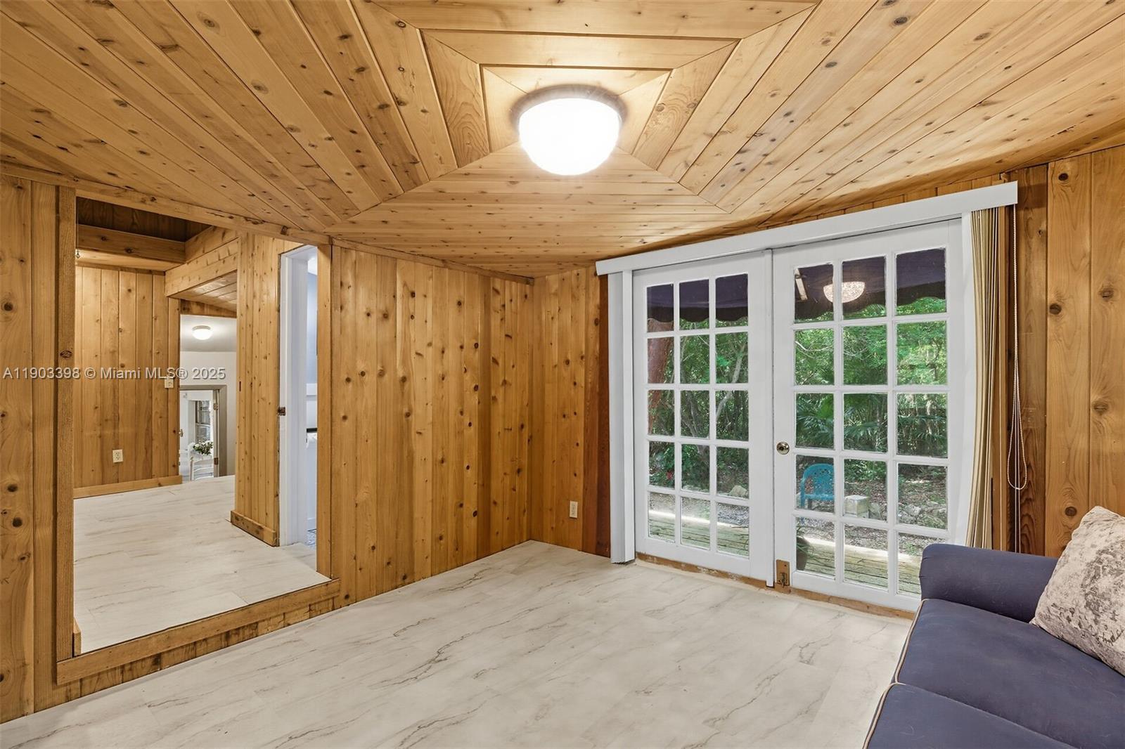 103 Tree Lane Tavernier, FL 33070 - Photo 16 of 33 a view of a livingroom with furniture and window