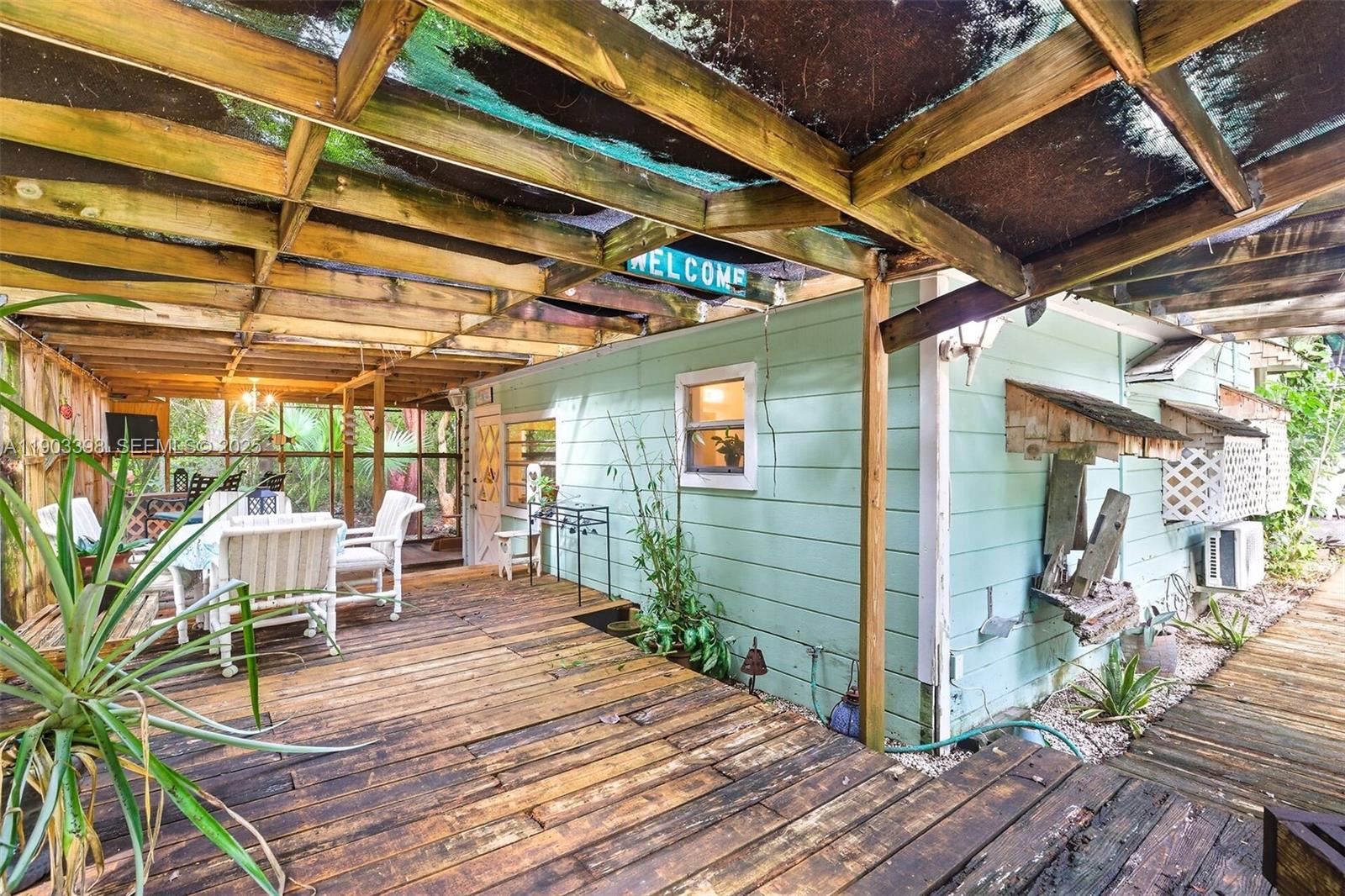 103 Tree Lane Tavernier, FL 33070 - Photo 30 of 33 a view of a backyard with sitting area