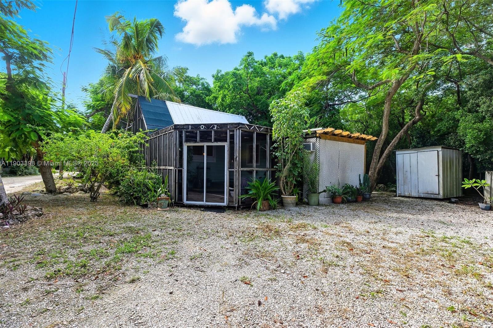 103 Tree Lane Tavernier, FL 33070 - Photo 33 of 33 a view of a house with a yard and tree