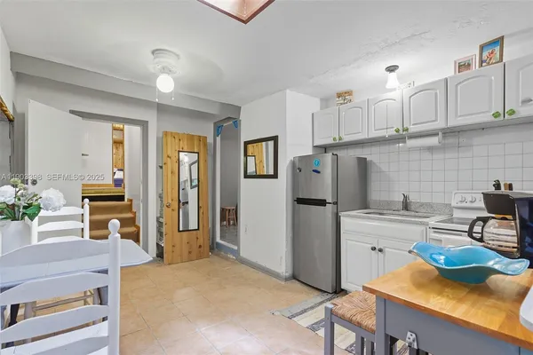 a bedroom with a bed and a cabinets