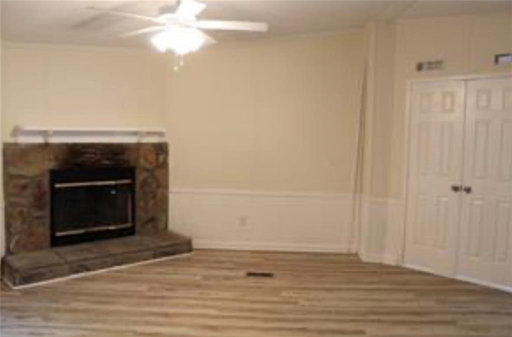 576 Nichols Road Pendergrass, GA 30567 - Photo 15 of 38 a view of a livingroom with a fireplace