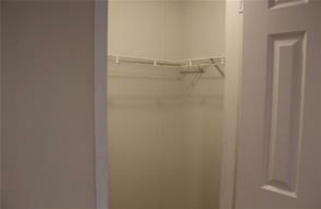 576 Nichols Road Pendergrass, GA 30567 - Photo 23 of 38 a bathroom with a glass shower door