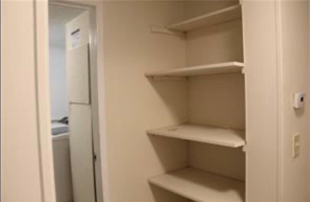 576 Nichols Road Pendergrass, GA 30567 - Photo 26 of 38 a white toilet sitting next to a white cabinet