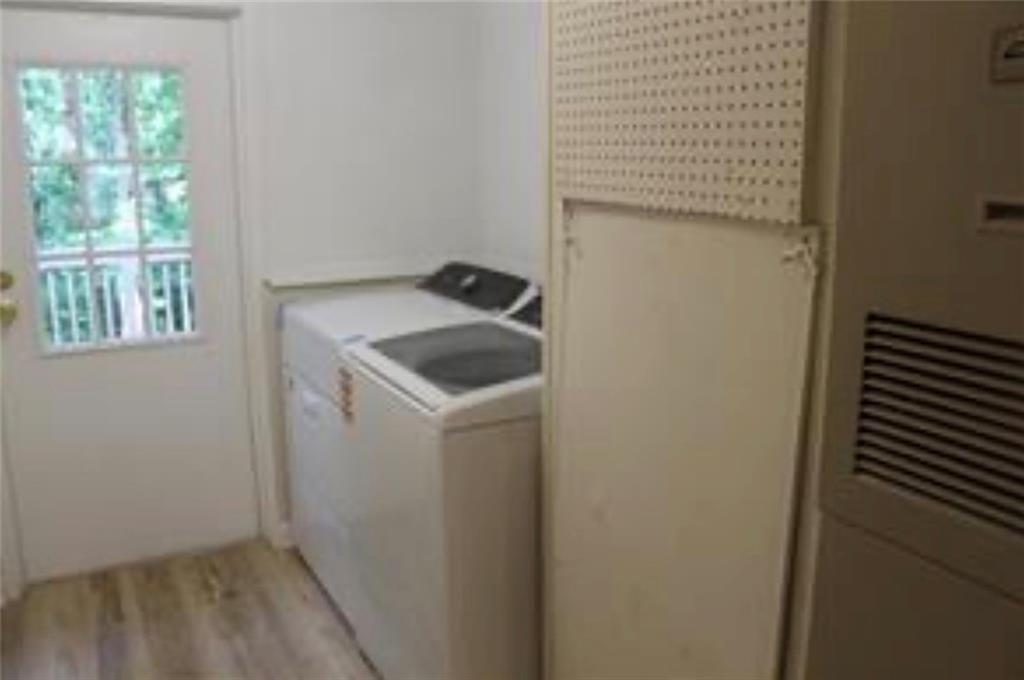 576 Nichols Road Pendergrass, GA 30567 - Photo 27 of 38 a utility room with window washer and dryer