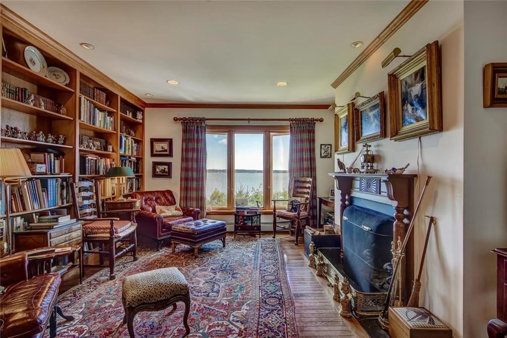 536 Reach Road Deer Isle, ME 04627 - Photo 11 of 33 Den with fireplace, built-in...