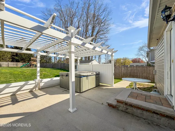 a view of outdoor space with playground and green space